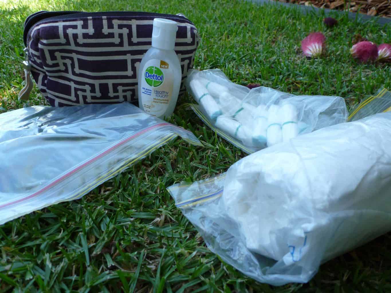 Ziploc bags, toilet paper, tampons, hand sanitiser & my discreet Qantas baggie to keep it all in.