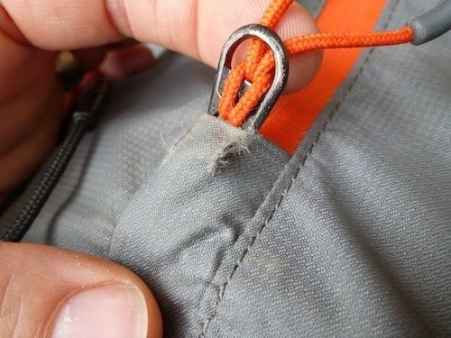 When dragged through rock slots, signs of wear show where a solid object (e.g. zipper) is behind.