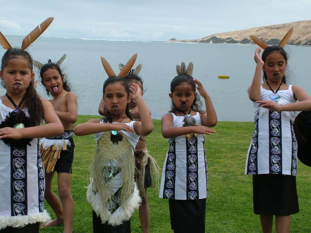 Children learning a traditional Maori dance