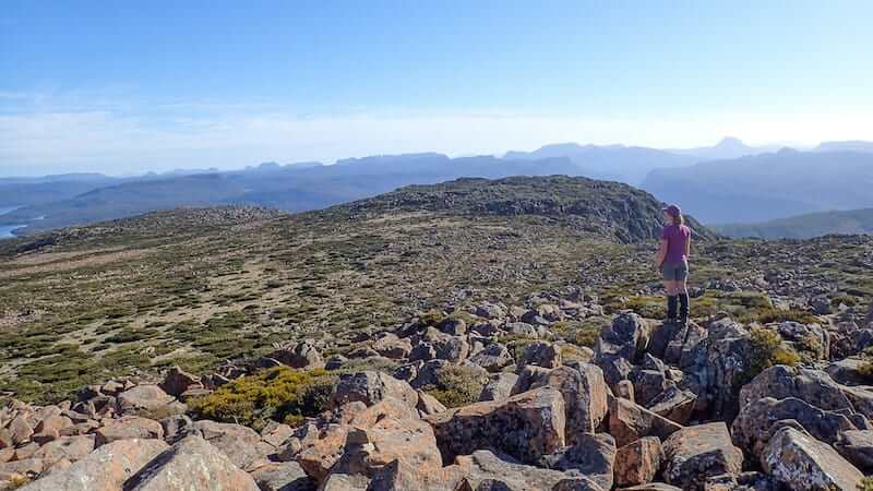 Female hiker looks across to the Overland Track