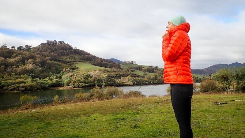 women in orange down jacket