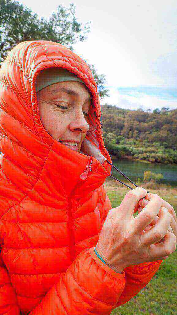 Woman in orange down jacket