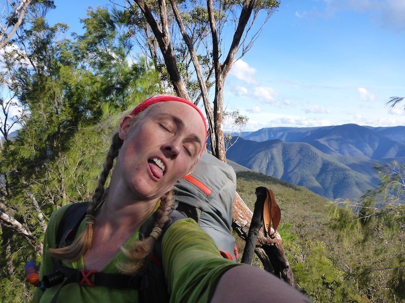 female hiker exhausted