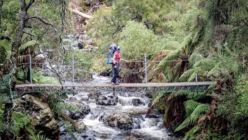 Hiker on bridge Hume and Hovell Track