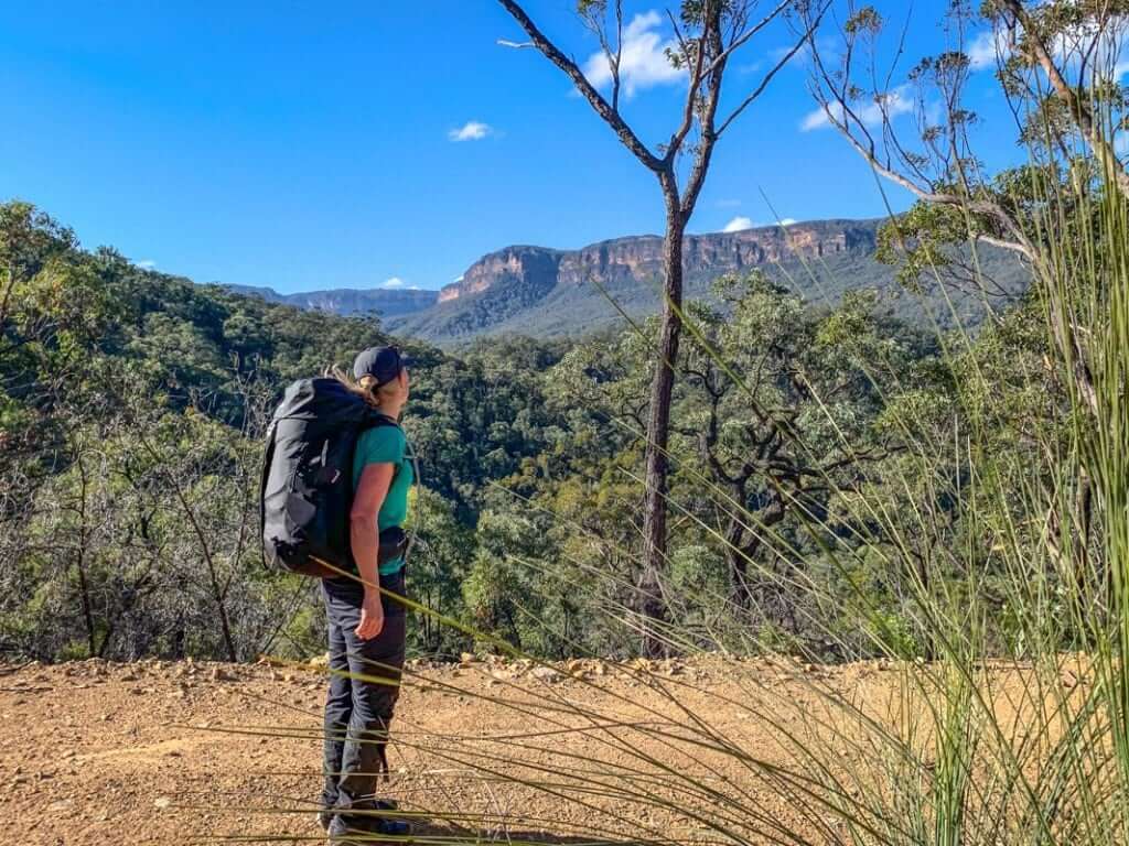 female hiker with macpac rhyolite in blue mountains australia