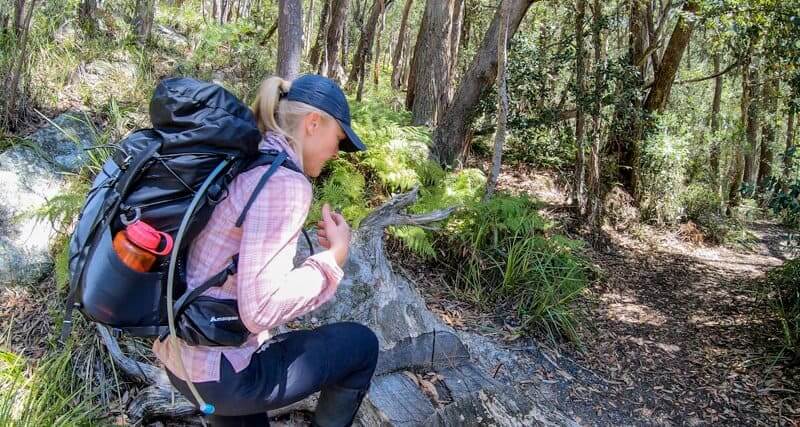 woman hiking with backpack