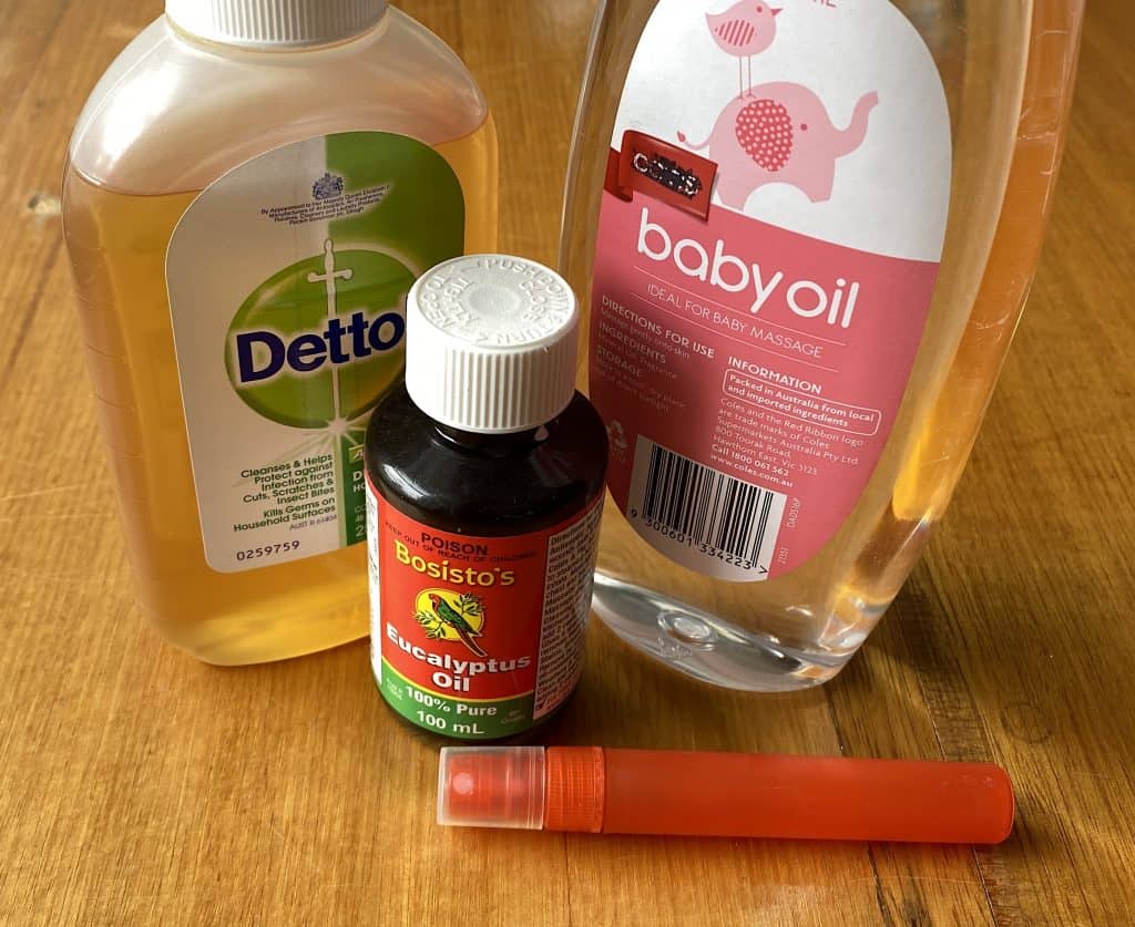 Dettol, Eucalyptus oil and baby oil. Ingredients for homemade insect repellent.